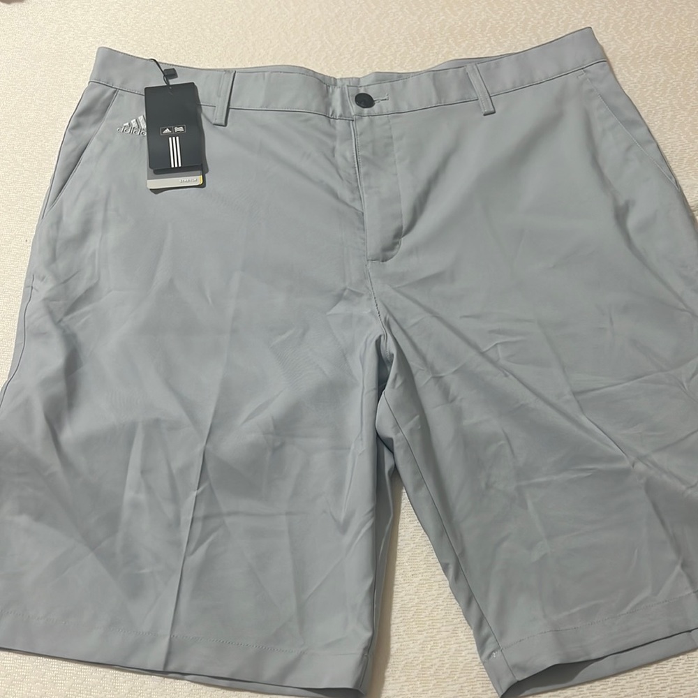 Adidas stretch grey golf shortsSize 38.   NWT.